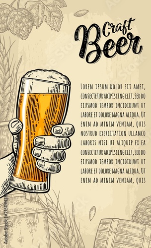Male hand holding beer glass. Craft Beer calligraphic lettering