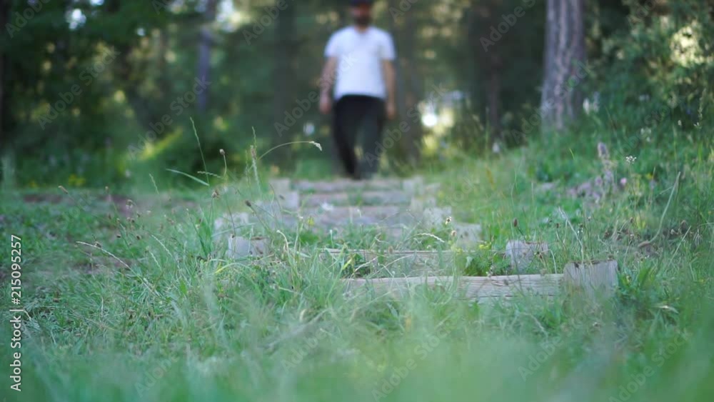walking on steps front in forest walking on steps front in forest