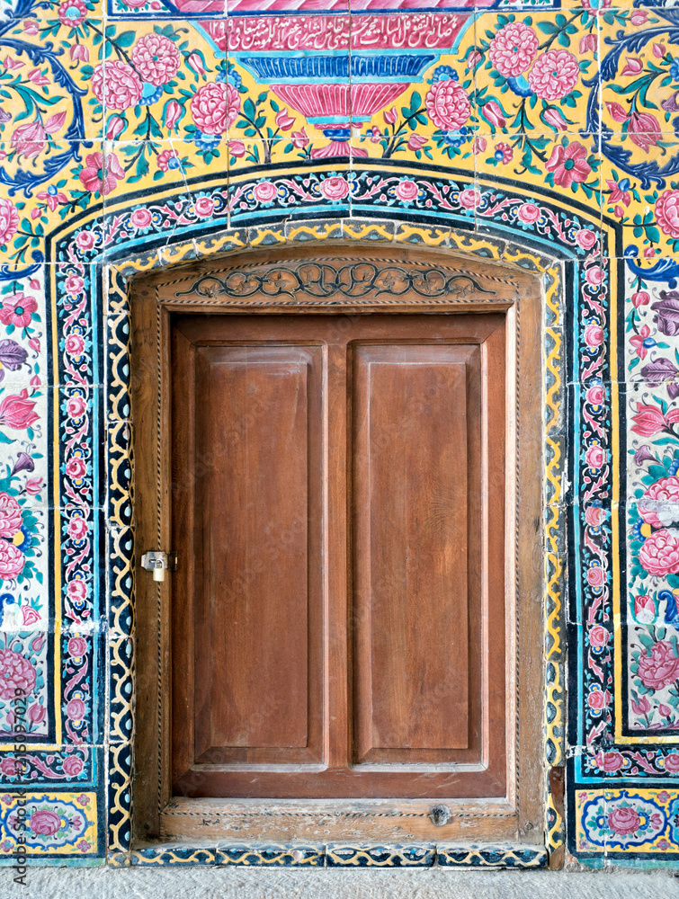 Wooden door at Nasir ol Molk mosque, Shiraz, Iran Wooden door at Nasir ol Molk mosque, Shiraz, Iran