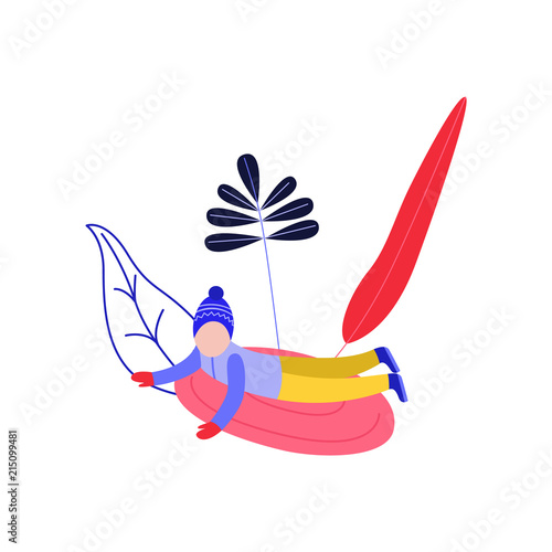 Flat boy kid in hat sledging at inflatable tube, snowtubing outdoors in winter in warm clothing on abstract floral elements background. Male child character and leisure activity. Vector illustration.