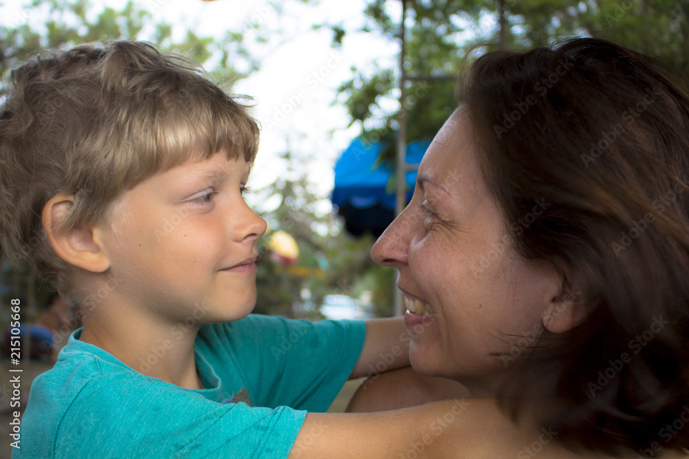 The son and mother look at each other. The son and mother look at each other.