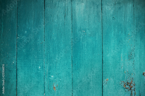 Shabby and very old wooden fence-color aquamarine.