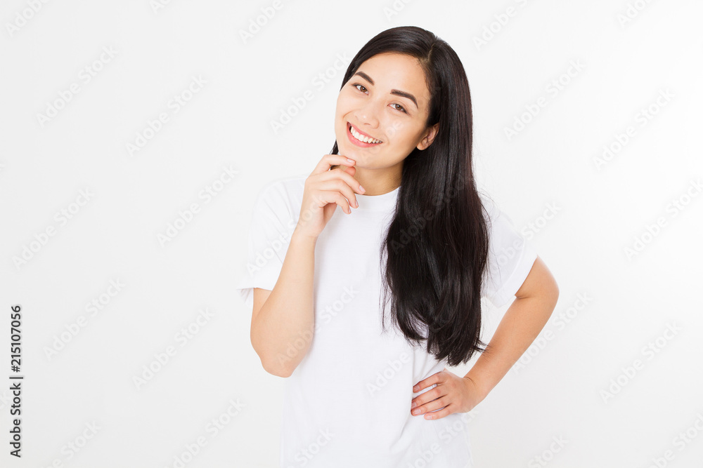Portrait of smiling Brunette asian girl with long and shiny straight female hair isolated on white background . Beautiful woman korean model with straight hairstyle. Healthy teeth. Copy space. Portrait of smiling Brunette asian girl with long and shiny straight female hair isolated on white background . Beautiful woman korean model with straight hairstyle. Healthy teeth. Copy space.