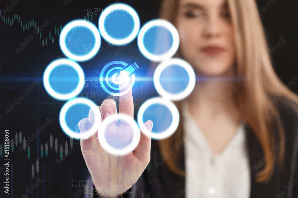 The concept of business, technology, the Internet and the network. A young entrepreneur working on a virtual screen of the future and sees the inscription: The concept of business, technology, the Internet and the network. A young entrepreneur working on a virtual screen of the future and sees the inscription: