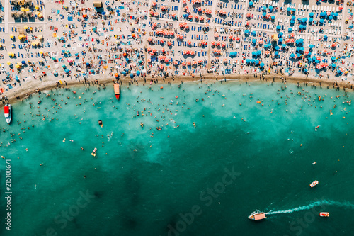 Aerial Drone View Of People Having Fun And Relaxing On Costinesti Beach In Romania At The Black Sea photo