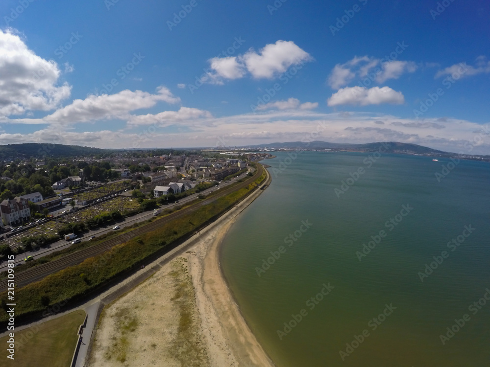aerial view on beach, coast of sea and city against sky in holywood northern ireland