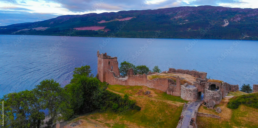 Urquhart Castle and Loch Ness in the evening - aerial drone view