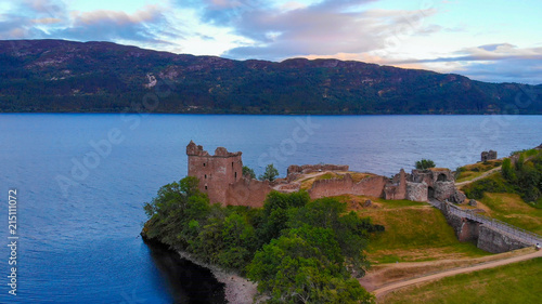 Loch Ness and Urquhart Castle in the evening - aerial view