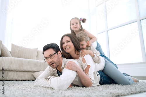 Happy family at home spending time togethe © ASDF
