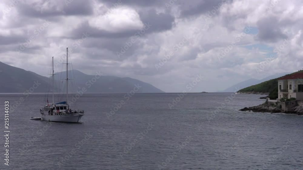 sailing yacht mooring in a bay of Kefalonia island sailing yacht mooring in a bay of Kefalonia island