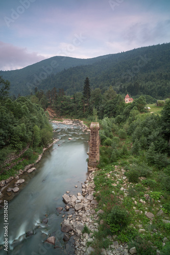 aerial view on the river in carpathian mountains at sunset,long exposure shot