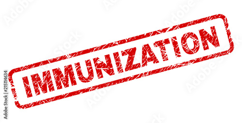 IMMUNIZATION stamp seal imprint with grunge style. Red vector rubber print of IMMUNIZATION text with grunge texture. Text caption is placed inside rounded rectangle frame.