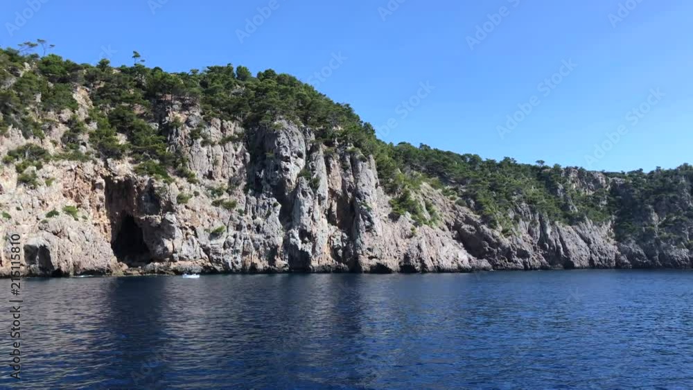 People enjoying summer sailing on boat or spending a sunny day on the beach People enjoying summer sailing on boat or spending a sunny day on the beach