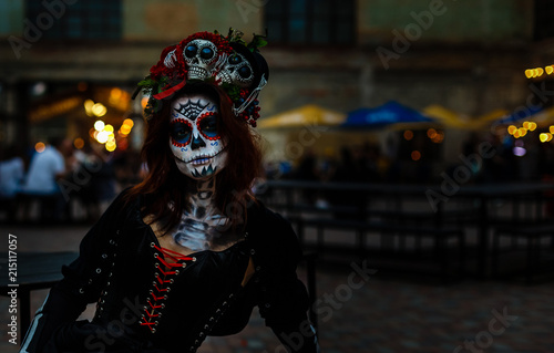 Attractive young woman with sugar skull makeup. Kiev, July 13, 2018 © Angelov