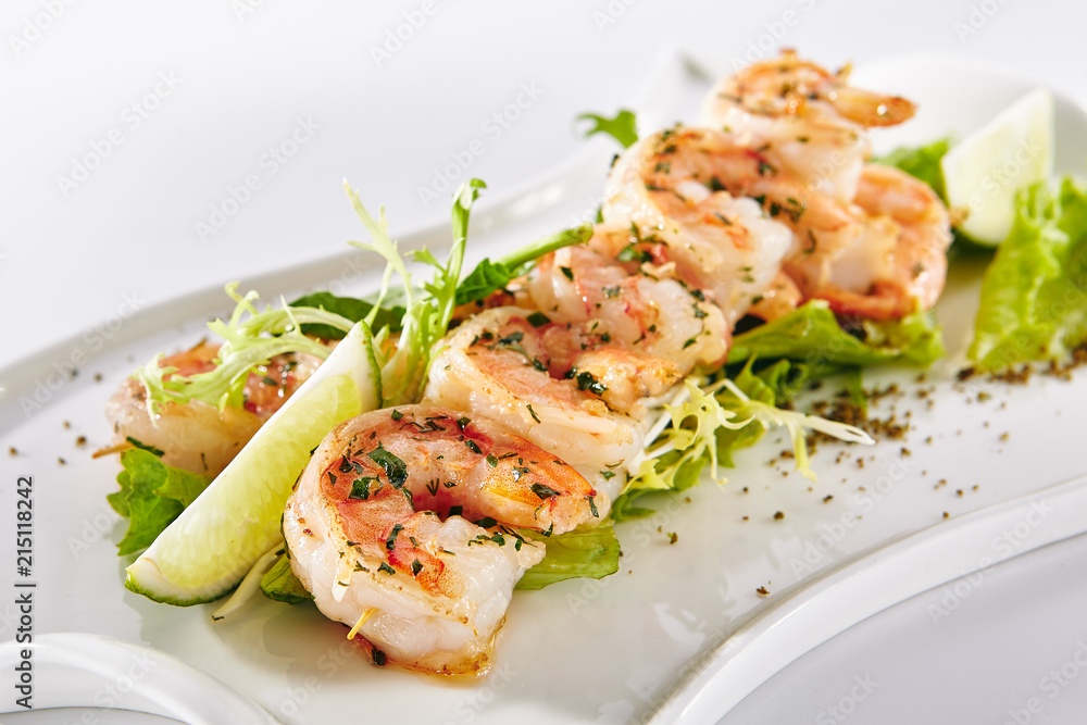 Skewered Tiger Prawns Fried with Garlic Skewered Tiger Prawns Fried with Garlic