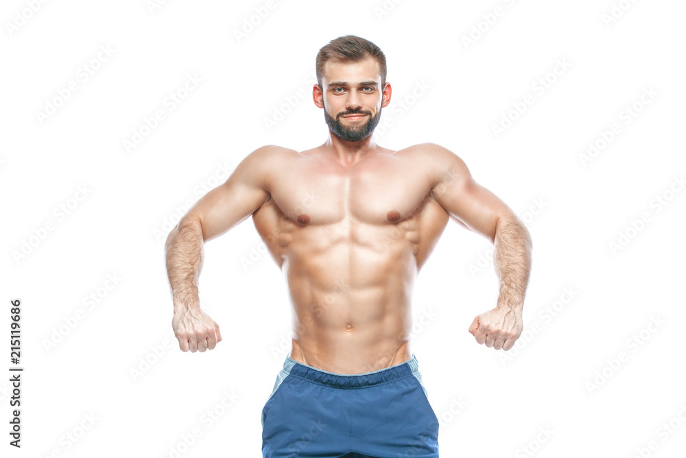 bodybuilder posing. Beautiful sporty guy male power. Fitness muscled in blue shorts. on isolated white background. Man with muscular torso. Strong Athletic Man Fitness Model Torso showing six pack abs bodybuilder posing. Beautiful sporty guy male power. Fitness muscled in blue shorts. on isolated white background. Man with muscular torso. Strong Athletic Man Fitness Model Torso showing six pack abs