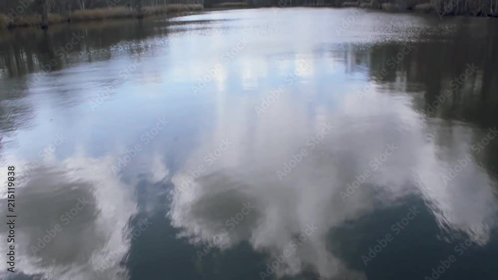 A reflective shot of water while on a boar A reflective shot of water while on a boar