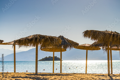 Fototapeta Naklejka Na Ścianę i Meble -  Sun parasols umbrellas on beach