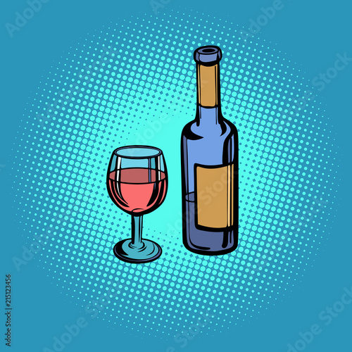 A bottle of red wine and a glass