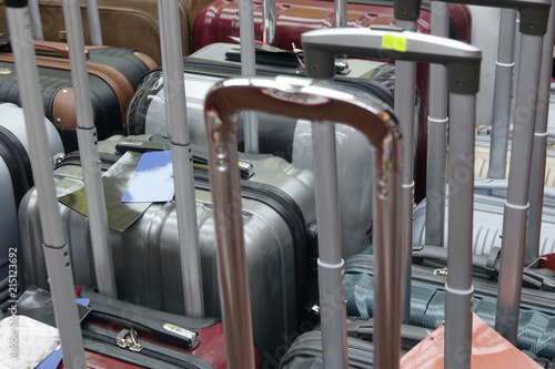 Close up of several new suitcases in a store