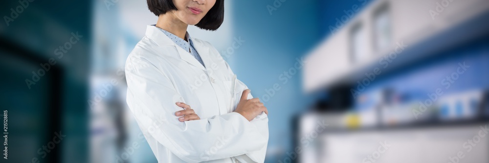 Composite image of doctor standing with arms crossed against Composite image of doctor standing with arms crossed against