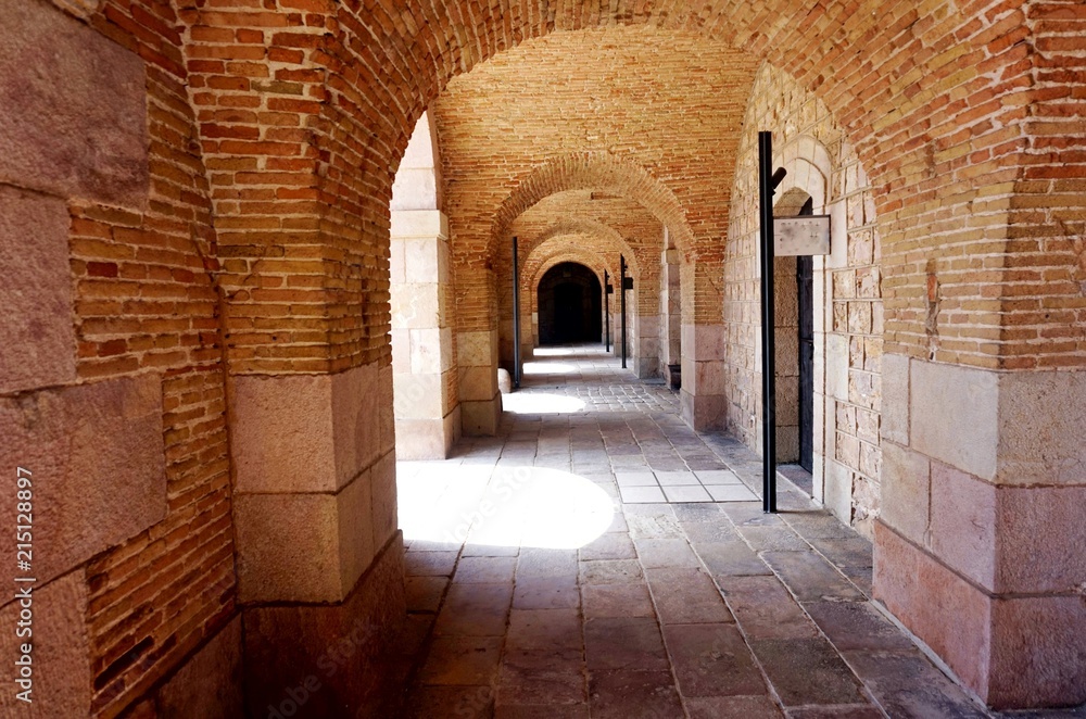 Wide deserted brick gallery or corridor in the fortress