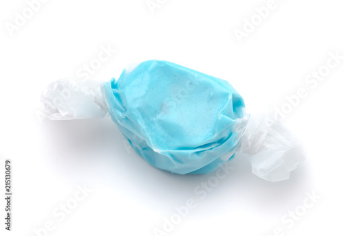 Single Piece of Bright Blue Salt Water Taffy on a White Background photo