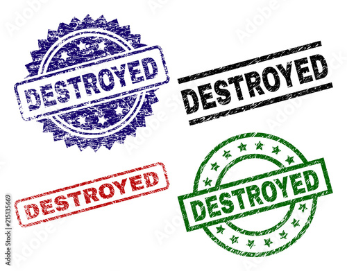 DESTROYED seal prints with distress surface. Black, green,red,blue vector rubber prints of DESTROYED title with unclean surface. Rubber seals with circle, rectangle, rosette shapes.