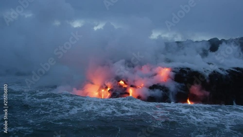 Molten Lava Streams from Hawaii's Kilauea Volcano Into the Ocean At Dawn
