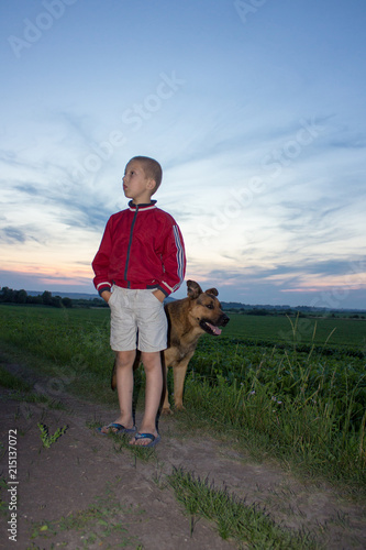 boy with dog evening