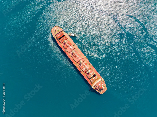 Large bulk carrier in the sea, aerial view. © ilyaplatonov