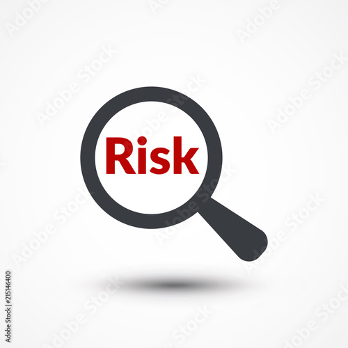 Magnifying glass with word risk on white background