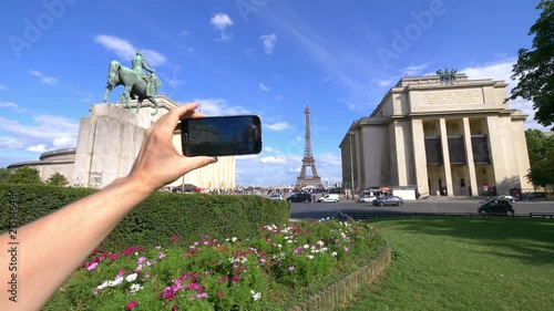 Professional video series of POV taking selfie on Eiffel Tower and Marshal Ferdinand Foch statue in Paris in 4K slow motion 60fps photo