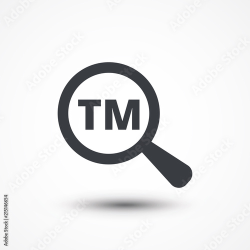 Magnifying glass with trademark icon and licensing word on white background