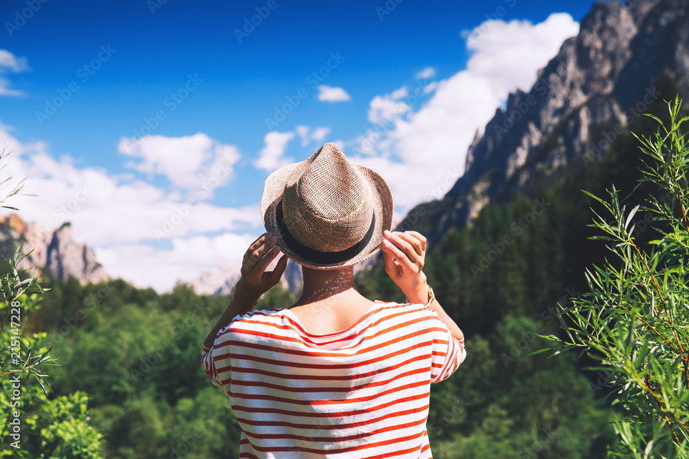 Hiker woman spend summer holiday in Dolomites, South Tyrol, Italy, Europe.