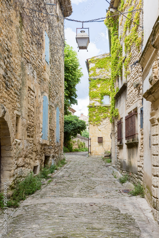 Narrow street of village Gordes in Provence, France