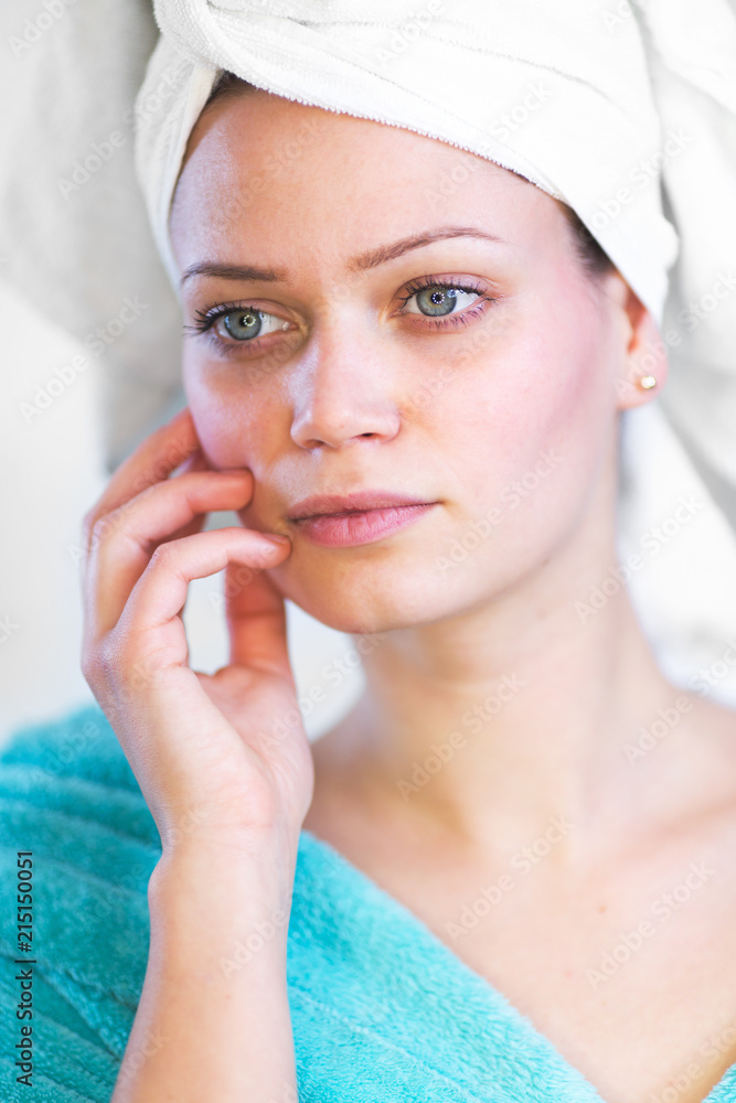 Beautiful young woman with hair in the towel Beautiful young woman with hair in the towel