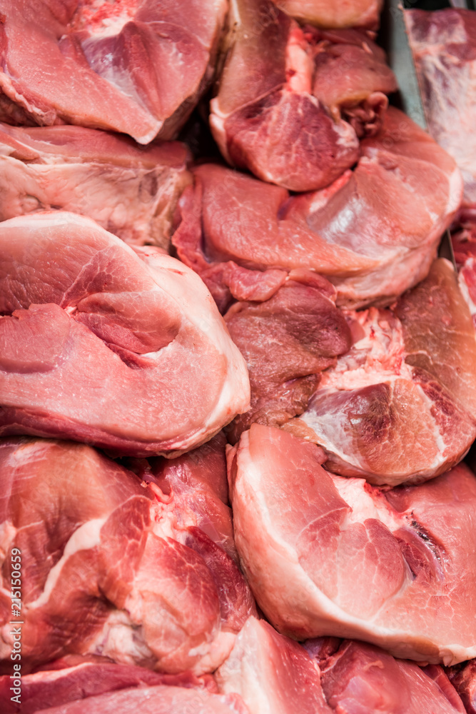 full frame image of arranged raw meat in grocery store