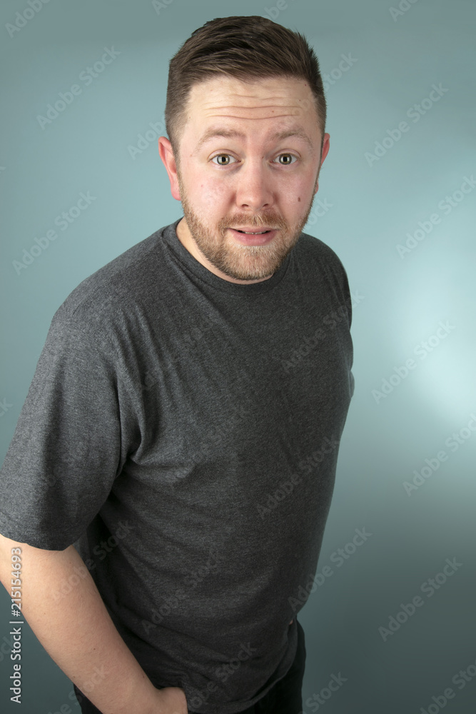 Man staring at the camera in astounded Man staring at the camera in astounded