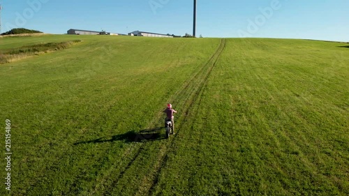 Guy on cross motorbike in nature photo