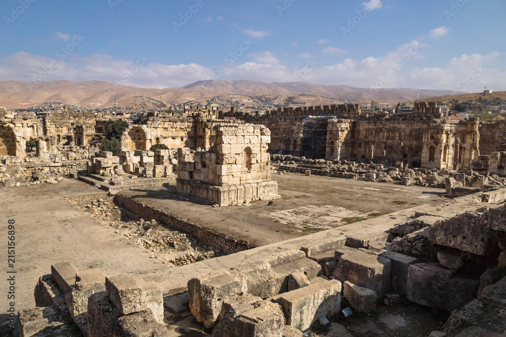 Ruins of great court of Heliopolis with mountains in the background in Baalbek, Bekaa valley Lebanon