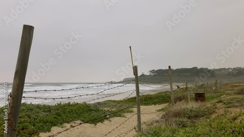 Winter, empty beach in north of Chile, Los Vilos, South America, cloudy day photo