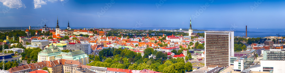 Picturesque Panoramic View of Tallinn Cityscape in Estonia. Taken from the Top Point in the City with View at Old City Center and Port with Bay.