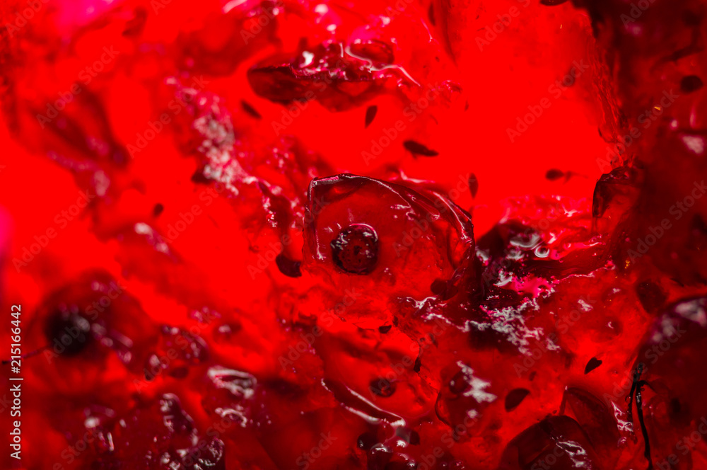 Bright translucent red currant jam in a glass jar Bright translucent red currant jam in a glass jar