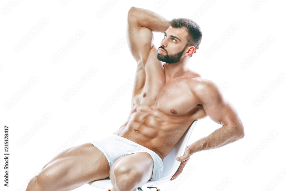 bodybuilder posing. Beautiful sporty guy male power. Fitness mus