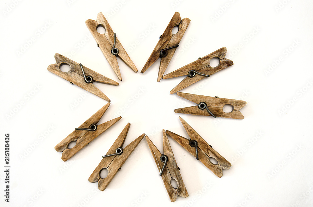 wooden old clothespins piecemeal, isolate on white background wooden old clothespins piecemeal, isolate on white background