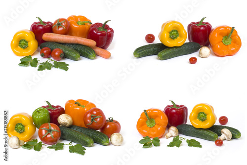 Red yellow and orange peppers with tomatoes on a white background..Cucumbers with colorful peppers in composition on a white background.