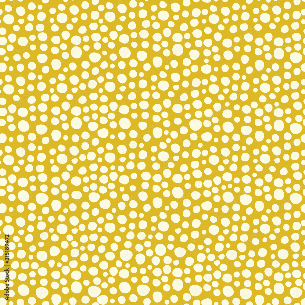 Snowflakes on a gold background seamless vector pattern. White irregular shaped dots. Scattered dots pattern. Perfect as background for Christmas. christmas packaging, cards, gift wrap.