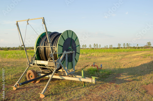 water pipeline on the agricultural field in spring.