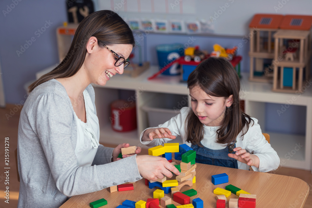 Preschool Teacher With Cute Girl - Creative Art Class Preschool Teacher With Cute Girl - Creative Art Class
